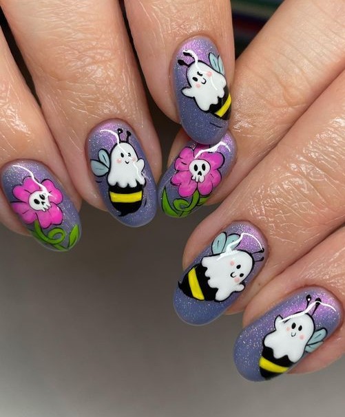 floral ghost nails for Halloween, flying ghost nail art