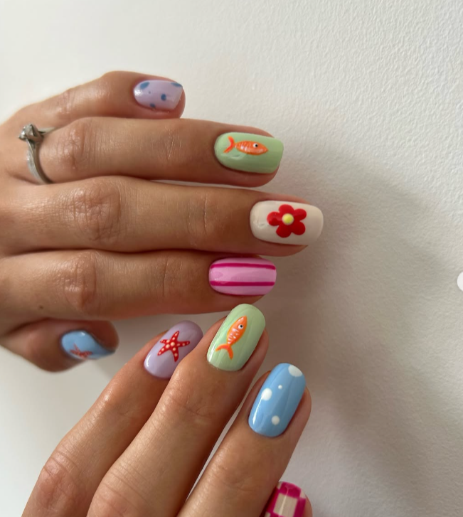pastel end of summer nail art floral motif - deepadesignstudio.com
