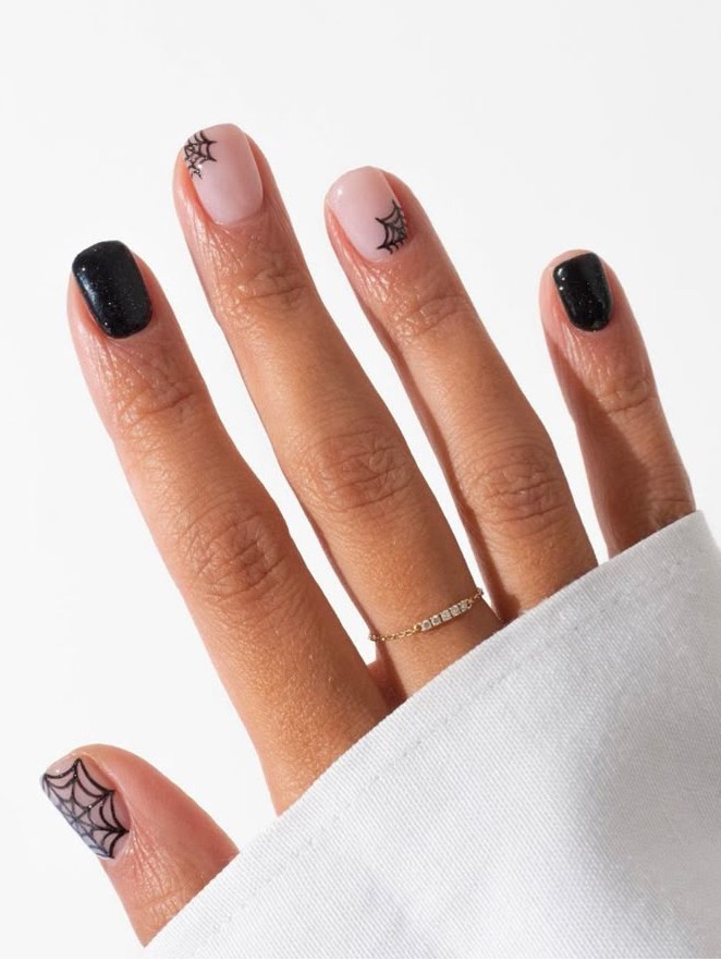 spider web on clean base nails black halloween october manicure
