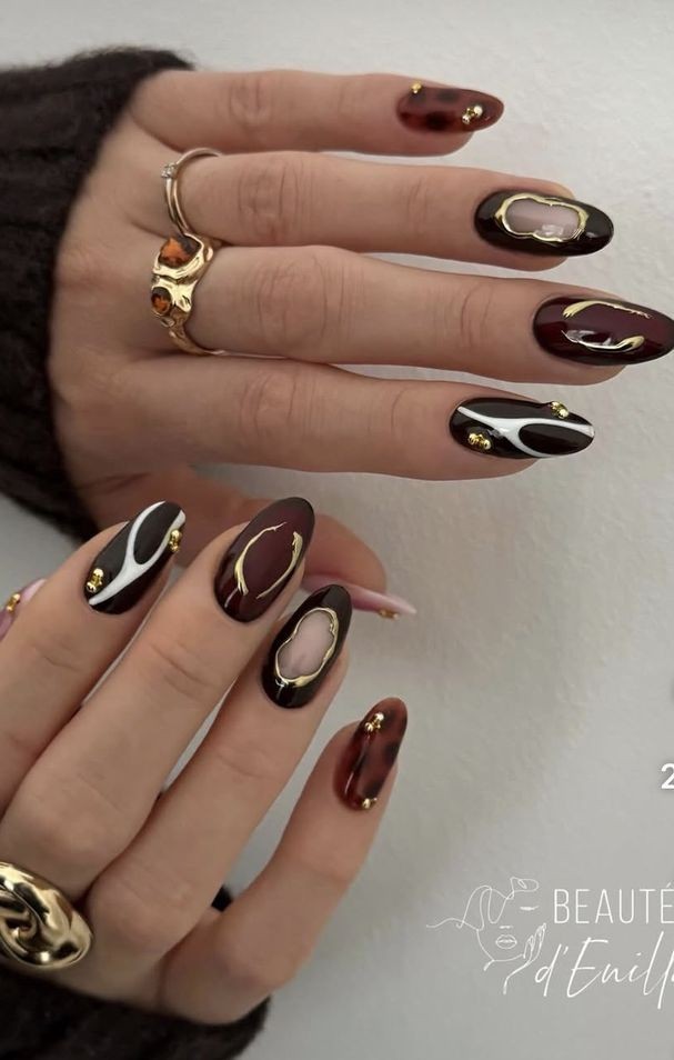 fall brown, black tortoiseshell classy nails with gold accent
