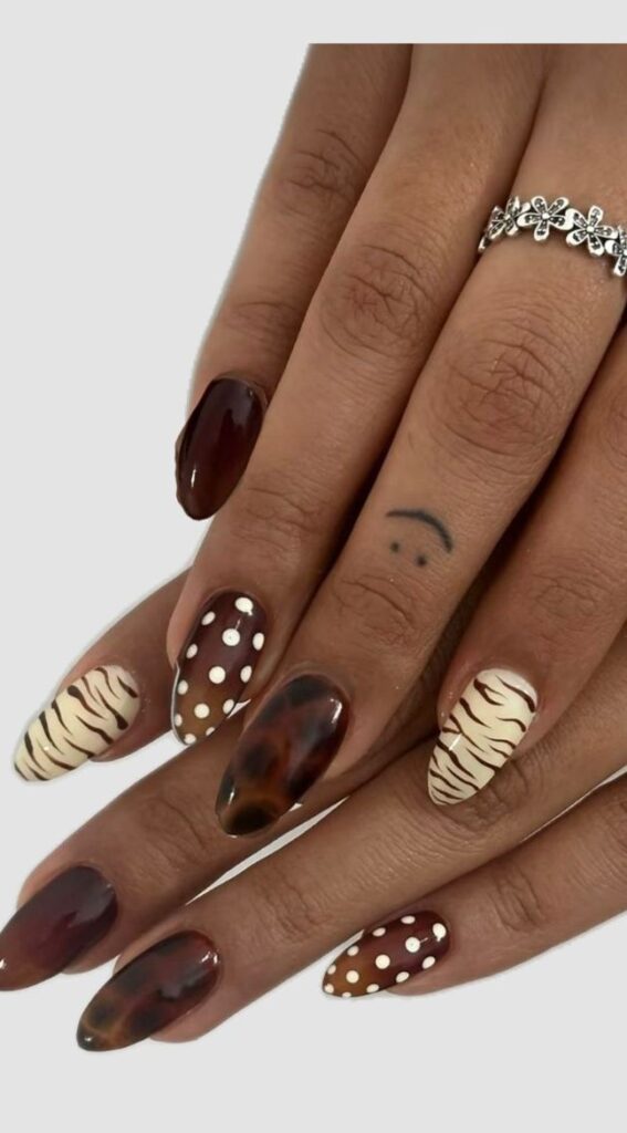 fall tortoiseshell nails with tiger print stripes and polka dots