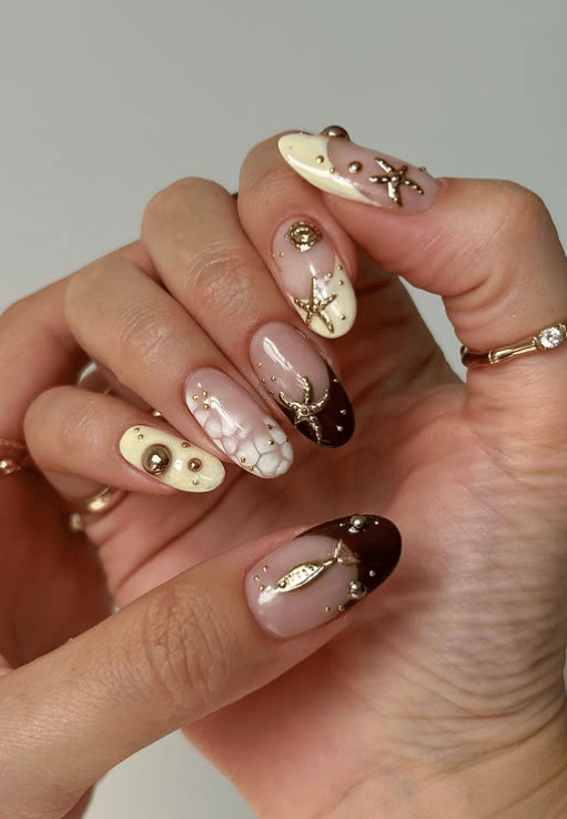 golden starfish nails @_by_shelley