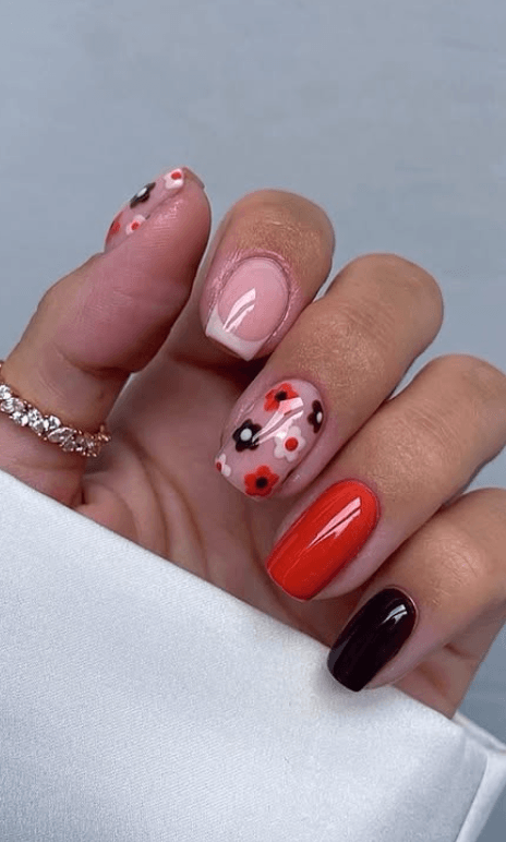 orange and black nails @nails.by.iz_